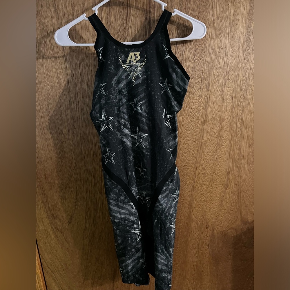 A3 size 32 Women’s power back suit.
